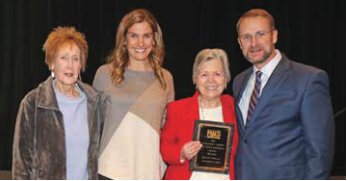 Retiring teacher Melanie Stokley being honored at the PALS Awards.
