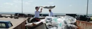 Volunteers disposing of trash