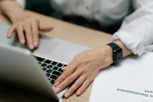 Hands at a desk
