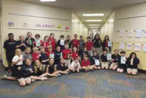 Students at Trinity Presbyterian School participating in the Clean Campus Program